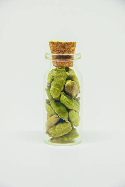 istock spices in jars on wooden background. selective focus. 1067834748