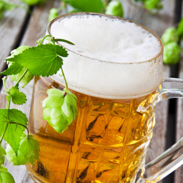istock Beer and hops  -  wooden background 1067838532