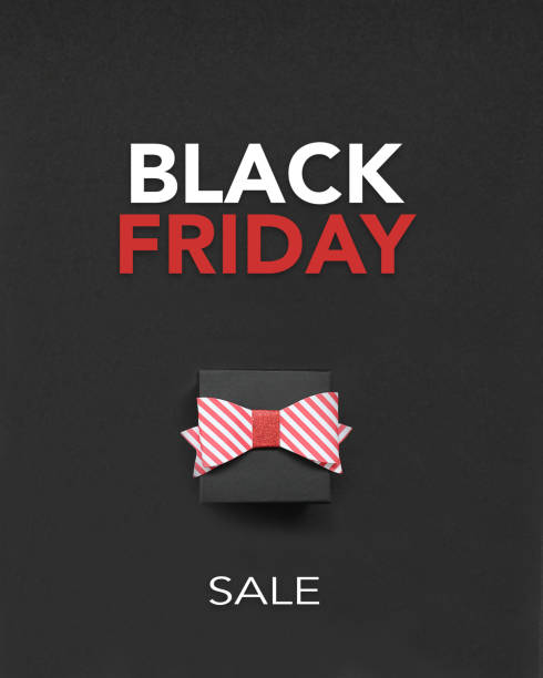 istock Gift Box with bow on black background and Black Friday Text 1067840002