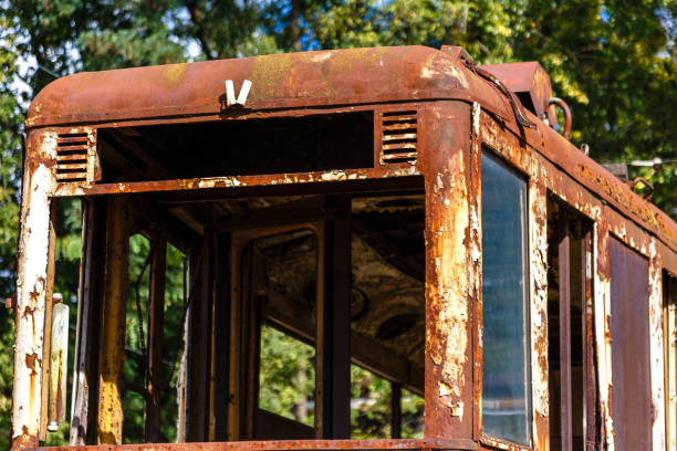 istock Old rusty destroyed wagon of tram outdoors at sunny day. 1067840308