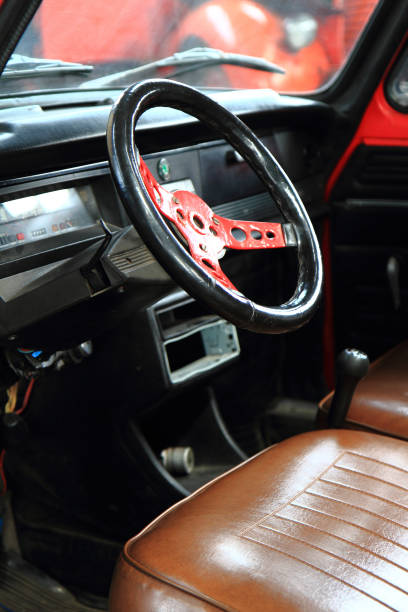 istock old car steering-wheel and interior 1067840516