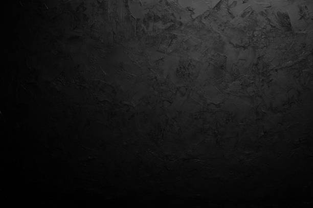 istock Black stone background. Black surface. Top view. Free space for your text. 1067848556