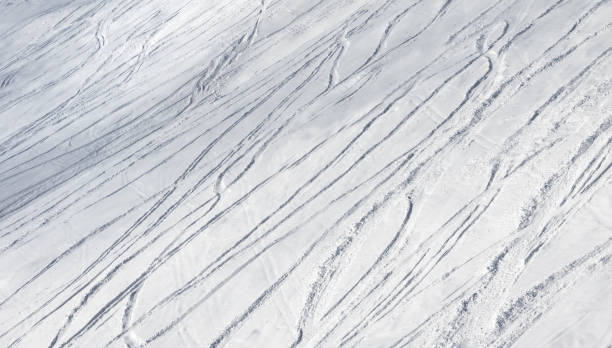 istock Snowy ski slope for freeride with trace from skis and snowboards 1067852078