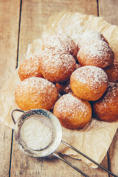 istock cottage cheese balls with powdered sugar. selective focus. 1067854630