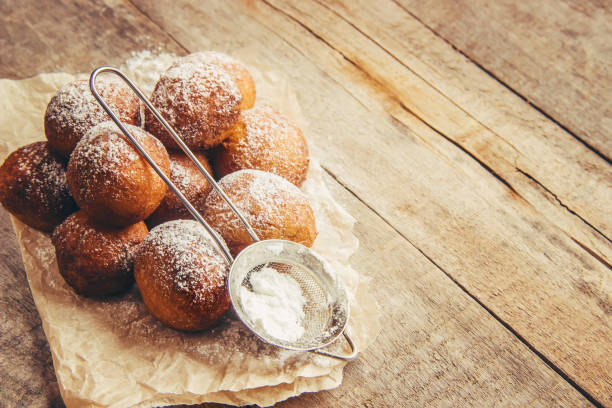 istock cottage cheese balls with powdered sugar. selective focus. 1067854688