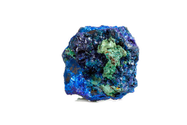 istock Macro mineral stone malachite with azurite on white background 1067857494