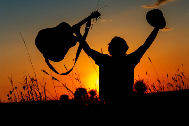 Silhouette of a Musician at sunset