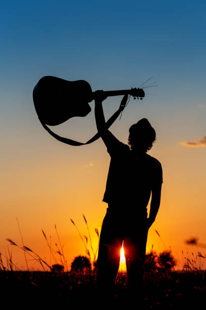 istock Silhouette of a Musician 1067861046