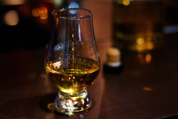 istock glencairn whiskey glass with single malt whiskey with space for text 1067861552