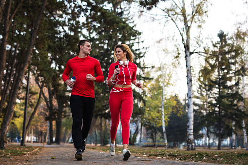 Handsome sport couple running together