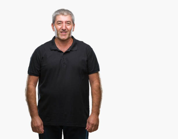 istock Handsome senior man over isolated background with serious expression on face. Simple and natural looking at the camera. 1067863214