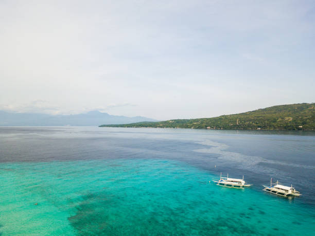 istock clear water with different colours in the sea 1067874834