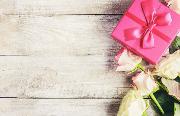 istock gift and flowers. selective focus. holideys and events. 1067879640