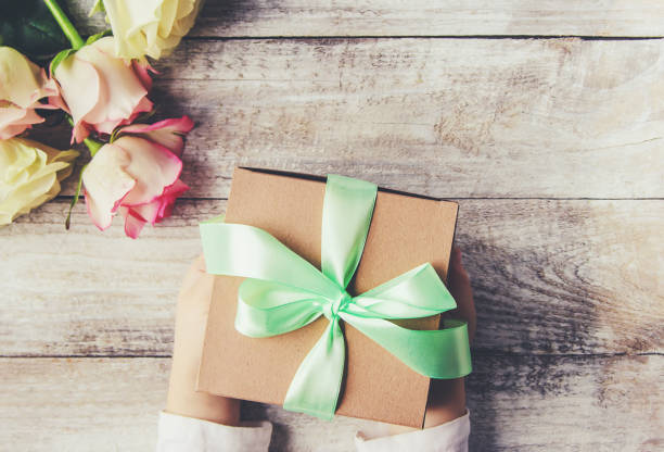 istock gift and flowers. selective focus. holideys and events. 1067879686