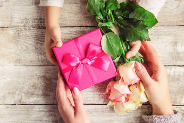 istock gift and flowers. selective focus. holideys and events. 1067880126