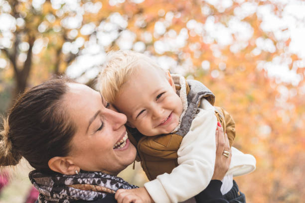 istock Aunt and nephew having good time in the park 1067881112
