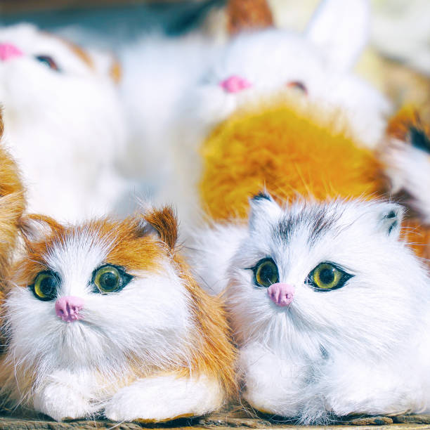 istock Soft toys kittens sitting in front of camera 1067882368