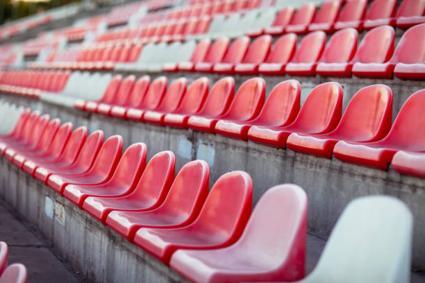istock Rows of empty seats in a sports stadium 1067891988