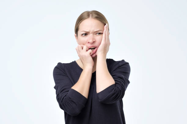 istock Desperate young caucasian woman is afraid of problems. 1067897556