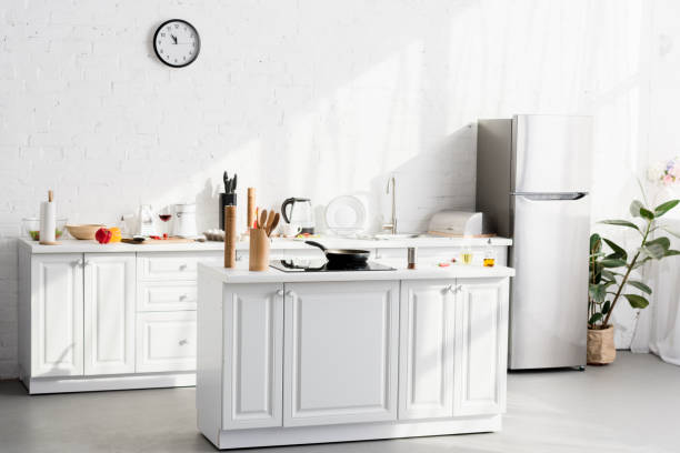 istock kitchen minimalistic interior with cooking supplies and devices 1067912638