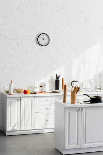istock kitchen minimalistic interior with cooking supplies and devices 1067912652