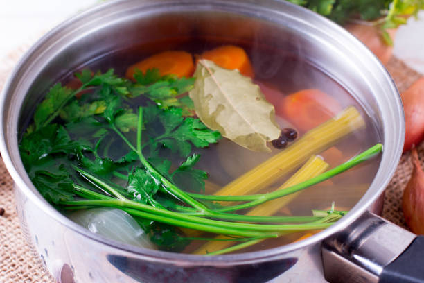 istock Vegetable broth with herbs and carrots 1067913998