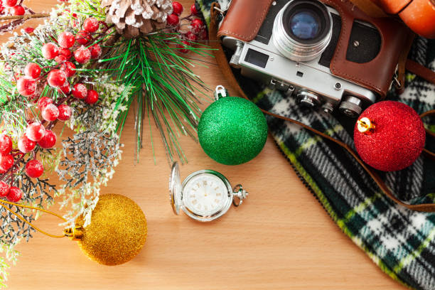 istock Pocket watch and retro camera 1067915858