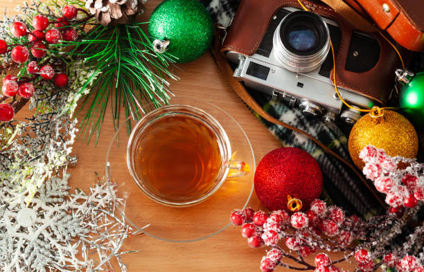istock Cup of tea and retro camera 1067915890