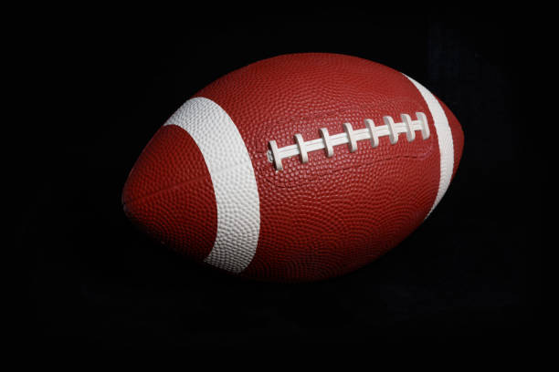 istock brown American Football 1067916348