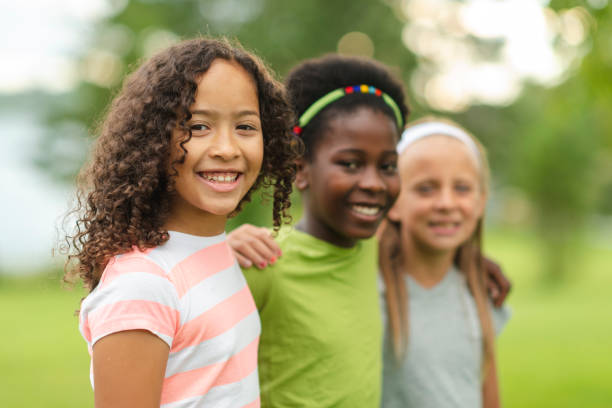 istock Kids hanging out at the park 1067917626