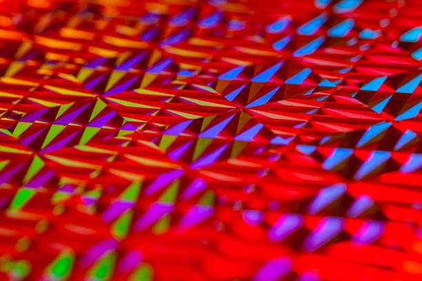 istock Texture of red foil with holographic effect. Christmas background. 1067920332
