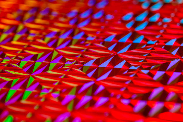 istock Texture of red foil with holographic effect. Christmas background. 1067920404
