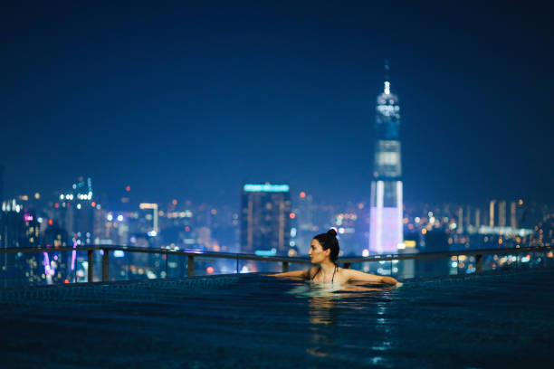 istock Night swimming in the pool in Malaysia 1067923864