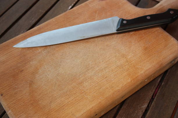 istock Kitchen knife on a wooden cutting board 1067924834