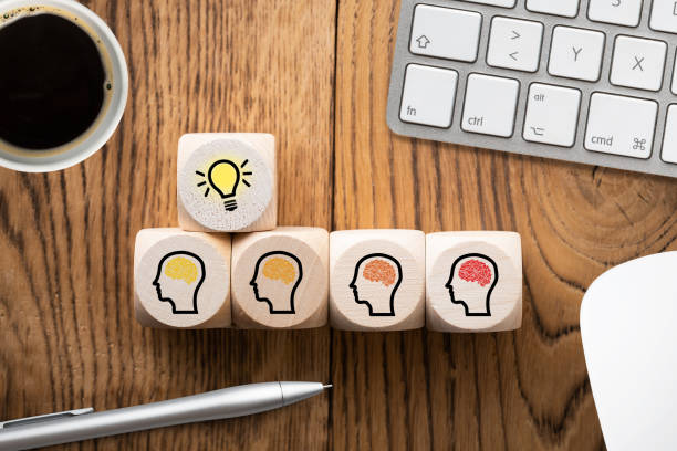 istock many people together having an idea symbolized by icons on cubes 1067928250