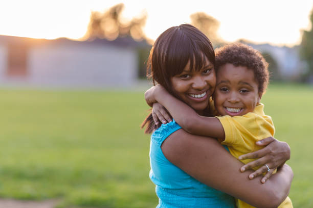 istock Mother and son hug 1067928972