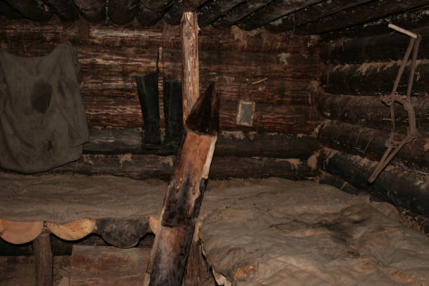 istock Hunters' cabin, interior, inside view. Sleeves, bedding for rest and sleep, 1067940666