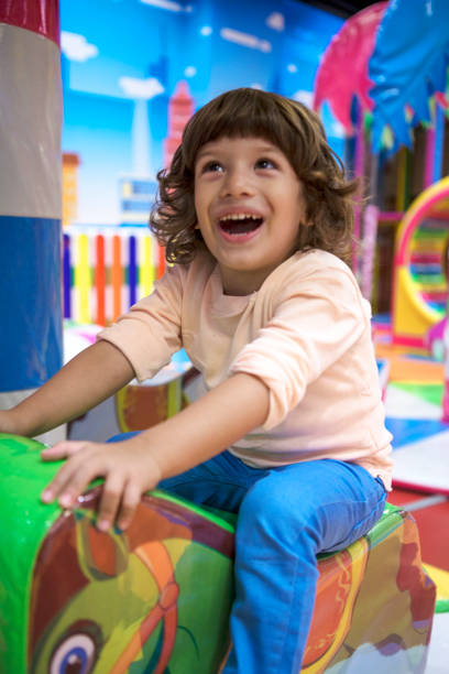 istock Happy smiley Little kid having fun on playground. 1067941206