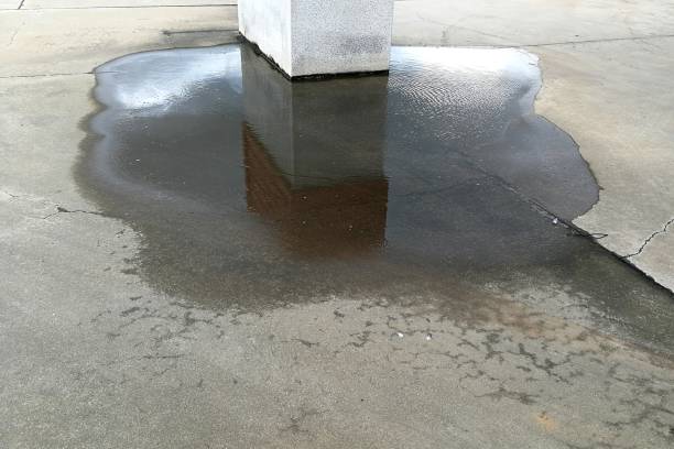 istock water on ground beside big pole 1067945216