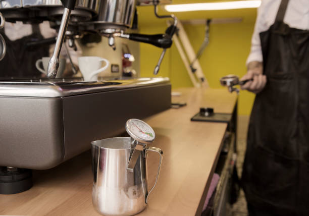 istock Barista preparing cup of coffee 1067950378