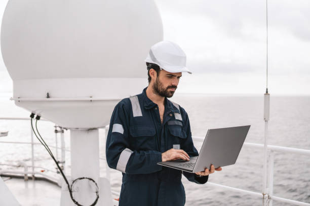 istock Service technician or serviceman near VSAT terminal 1067957070