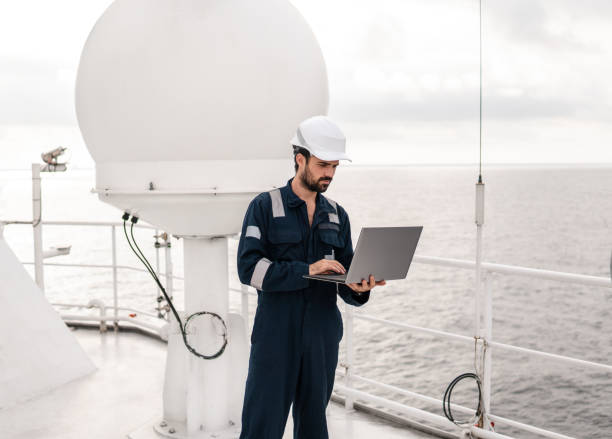 istock Service technician or serviceman near VSAT terminal 1067957156
