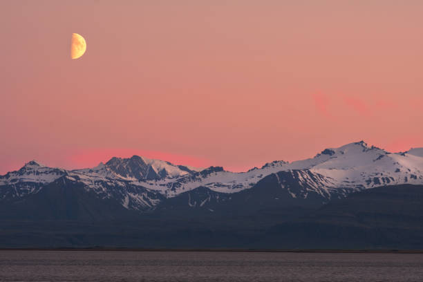 istock Half moon over Vatnajokull glacier 1067962920