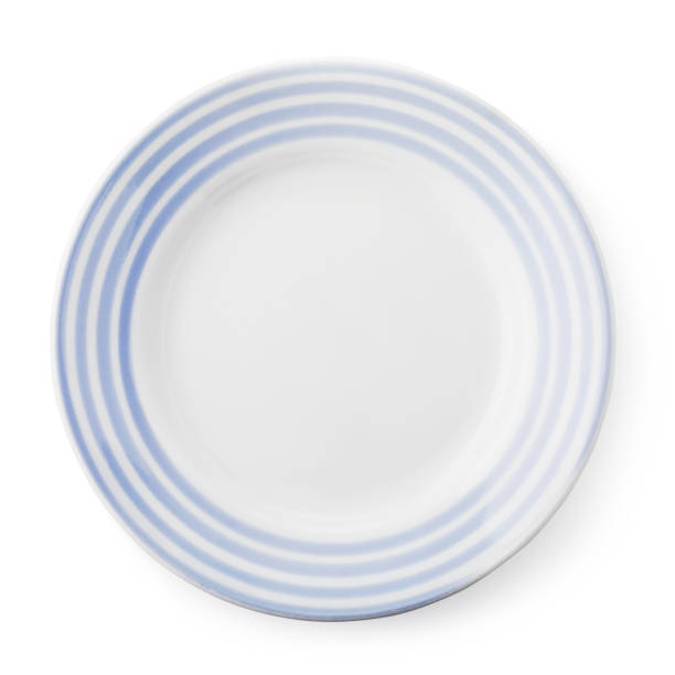 istock White and blue empty ceramic plate, top view of an isolated object 1067969130