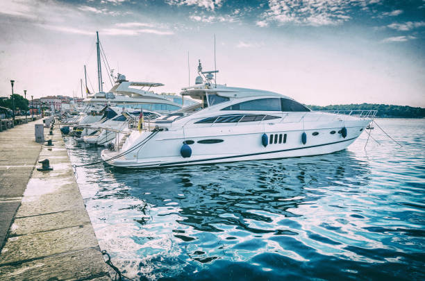 istock Yachts in port, Porec, Croatia, analog filter 1067970144