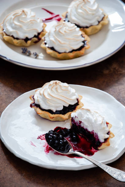 istock Blueberry lavender meringue tartlets 1067974278