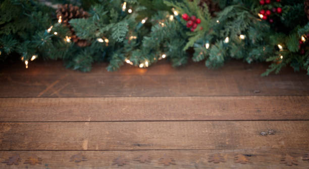 istock Christmas Garland on an Old Wood Background 1067997432