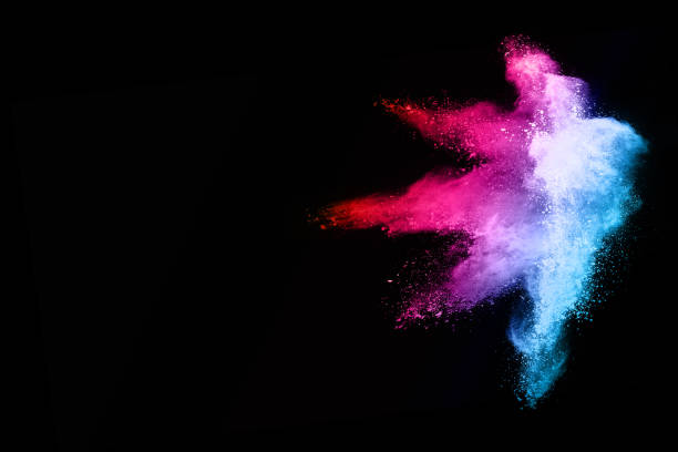 istock abstract colored dust explosion on a black background.abstract powder splatted background,Freeze motion of color powder exploding/throwing color powder, multicolored glitter texture. 1067997644