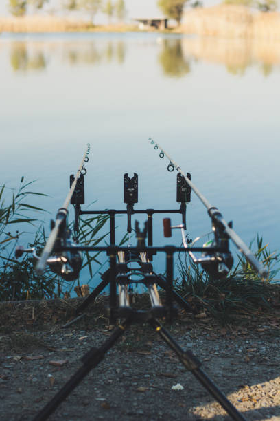 istock Fishing rods near river 1068009664