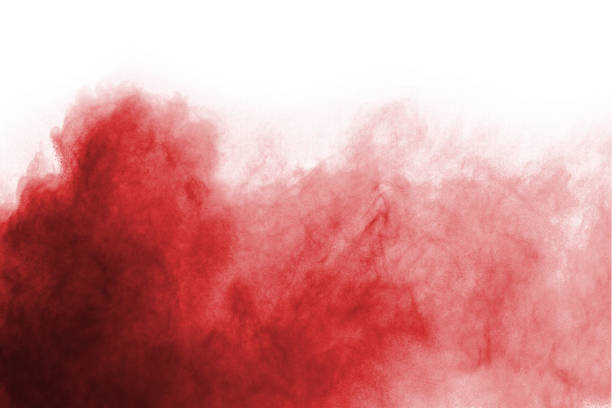 istock abstract red dust explosion on white background. abstract red powder splatted on white background, Freeze motion of red powder exploding. 1068013534